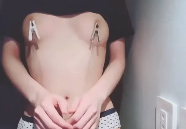 Black t-shirt with nipple clip P1
